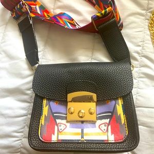 Small clutch with strap